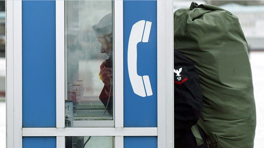 Sailor in phone booth ap.jpg